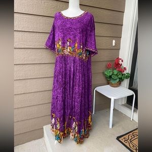 Woman Within bohemian women’ purple dress African scene
